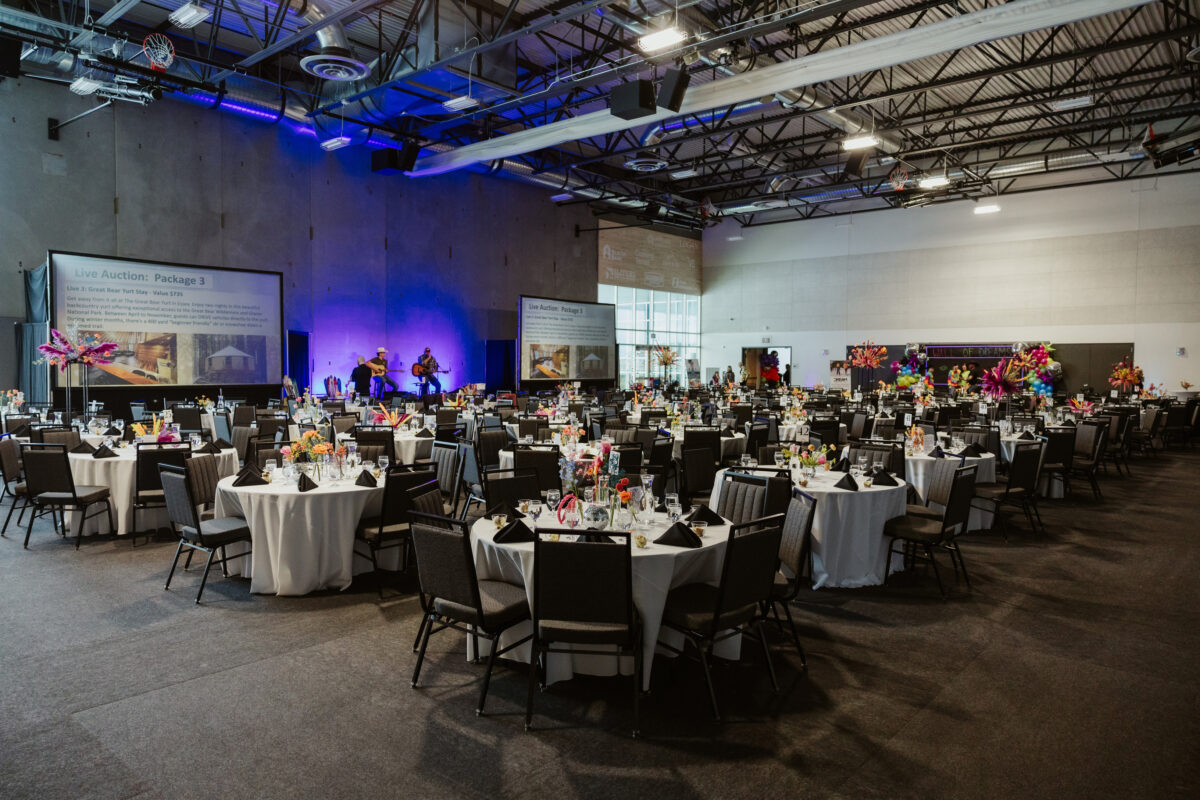 DREAM Adaptive Snow Ball event with dining tables and stage