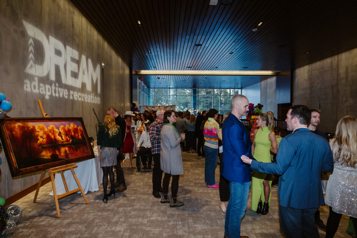 DREAM Adaptive Snow Ball event with people mingling