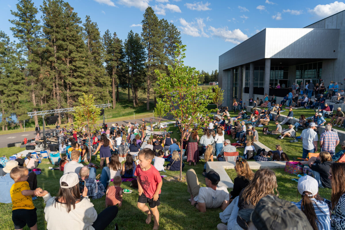 Event with people at O'Shaughnessy Outdoor Amphitheatre space with people on the grass