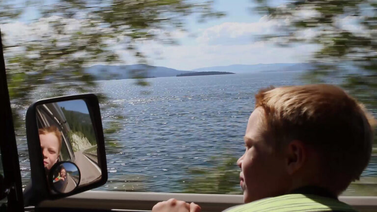 Boy looking out the car window